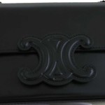 赛琳 Triomphe 系列黑色亮面皮革单肩包