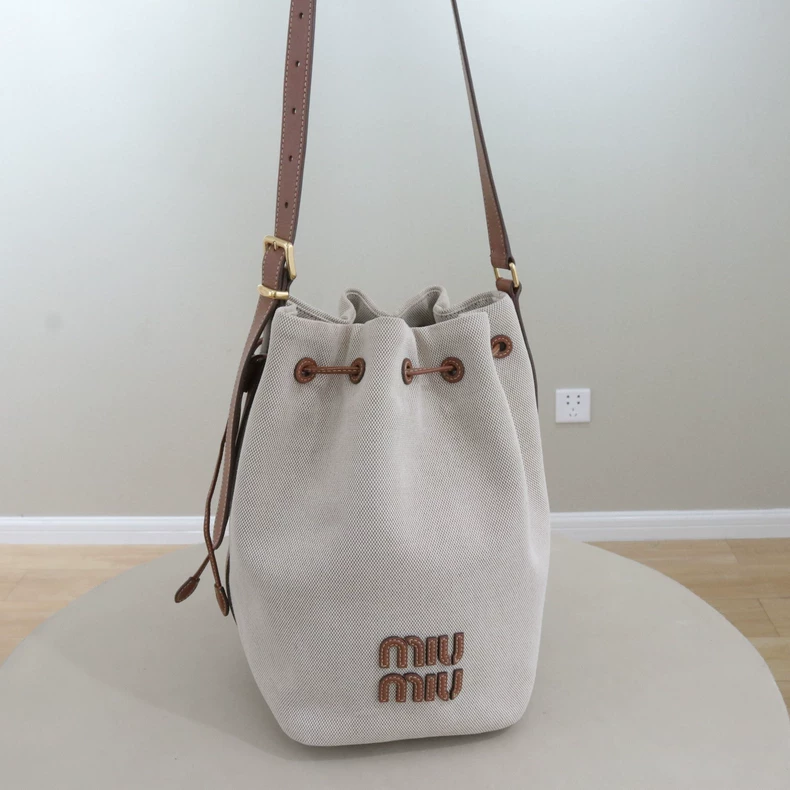 Miu Miu Logo Canvas & Leather Drawstring Bucket Bag