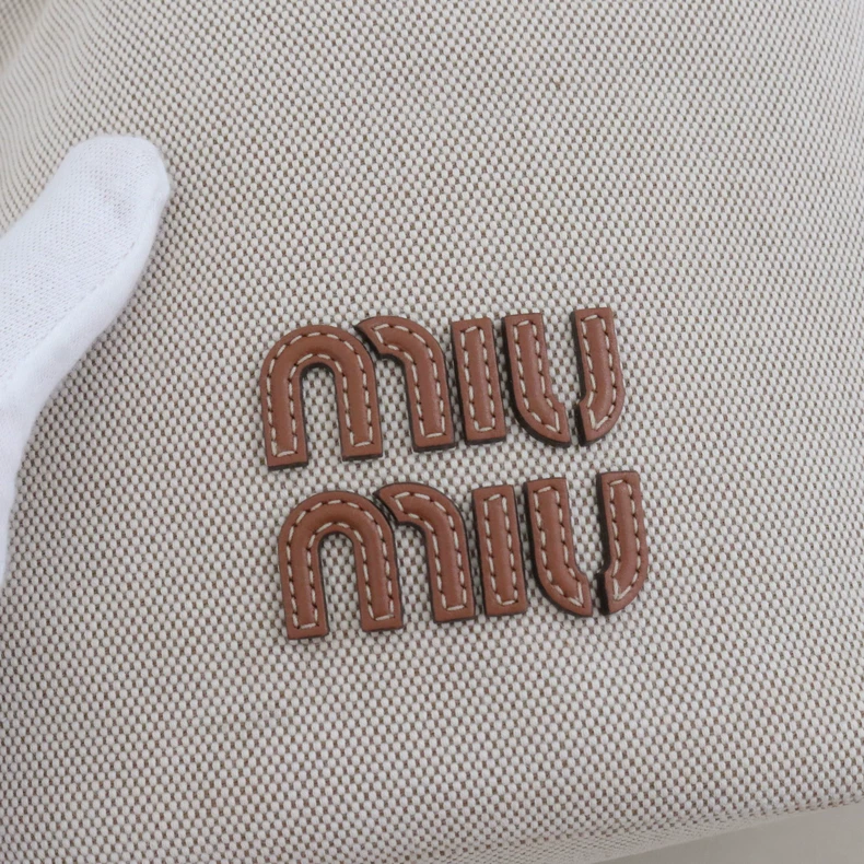 Miu Miu Logo Canvas & Leather Drawstring Bucket Bag
